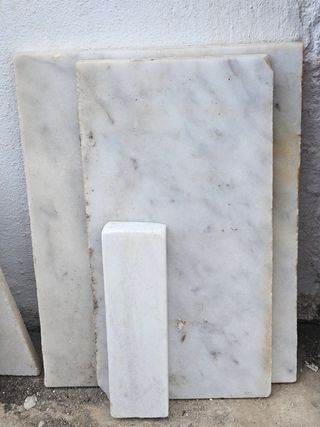 Varias piezas mármol blanco