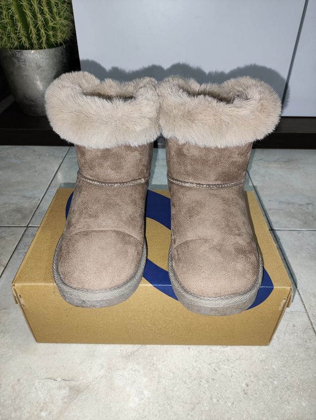 Botas de invierno beige con lazo