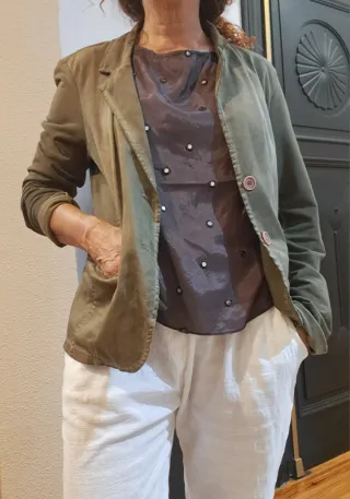 Americana verde caqui desgastada algodón