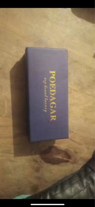 Reloj POEDAGAR Azul y Dorado