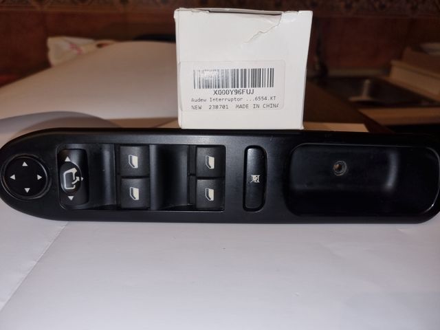 Mando Elevalunas Peugeot 307cc.
Parasoles 
Cortina