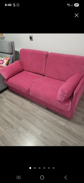 Sofá cama rosa de tela