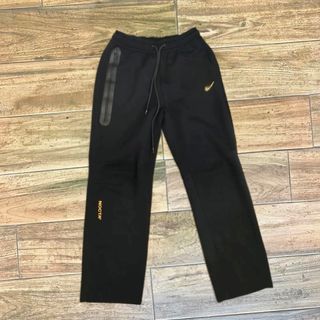 Conjunto Nike Tech Fleece NOCTA Negro Amarillo