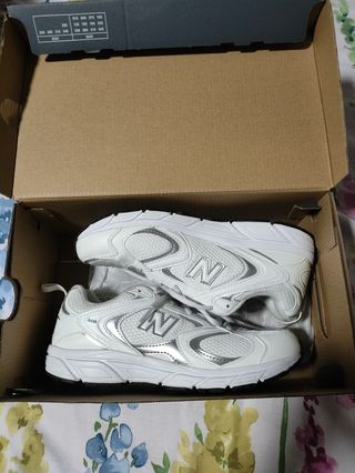 Zapatillas New Balance 408 Blancas y Plateadas