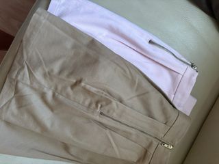 Faldas plisadas color marrón y rosa
