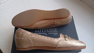 Zapatos Lottusse dorados mujer