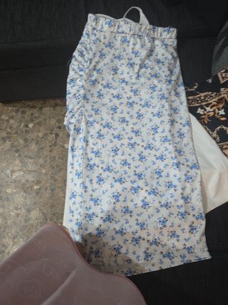 Mono corto negro con ojo místico y vestidos y fald