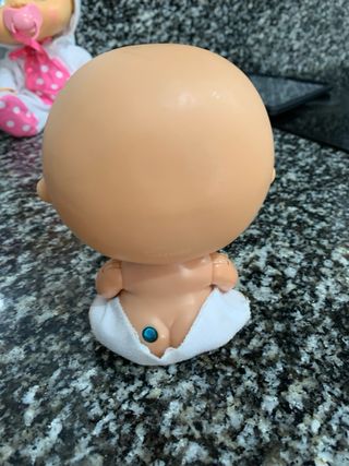 Bebé Llorón con traje de conejo y chupete