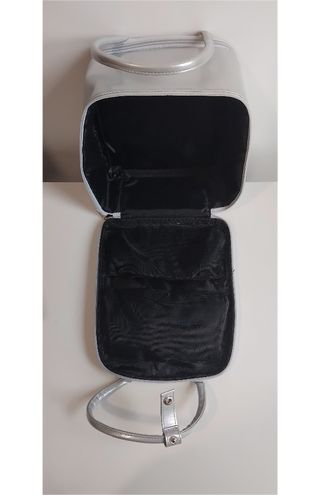 Bolso cosmética con compartimentos.