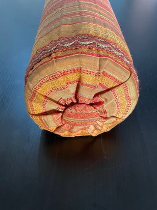 Cuscino tondo tessuto arancione giallo