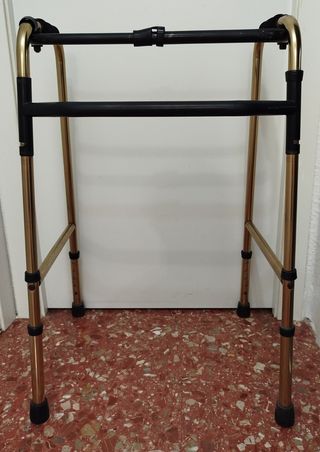 Andador plegable aluminio dorado