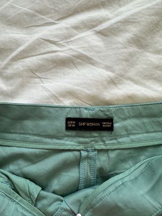 Pantalones de pinzas turquesa