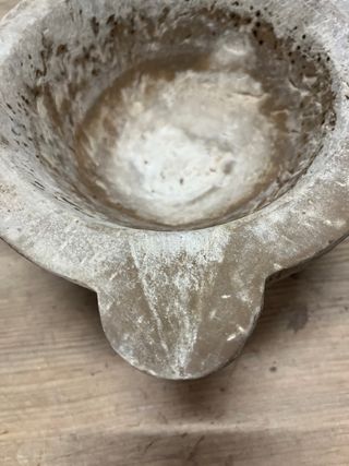 Mortero de piedra antiguo