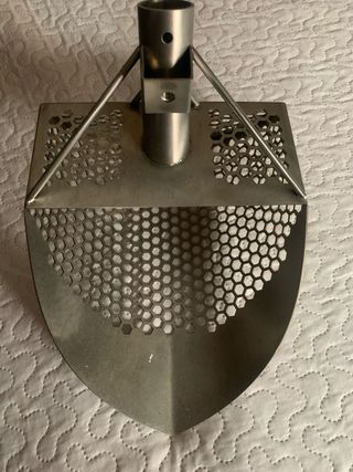 Pala de arena metálica