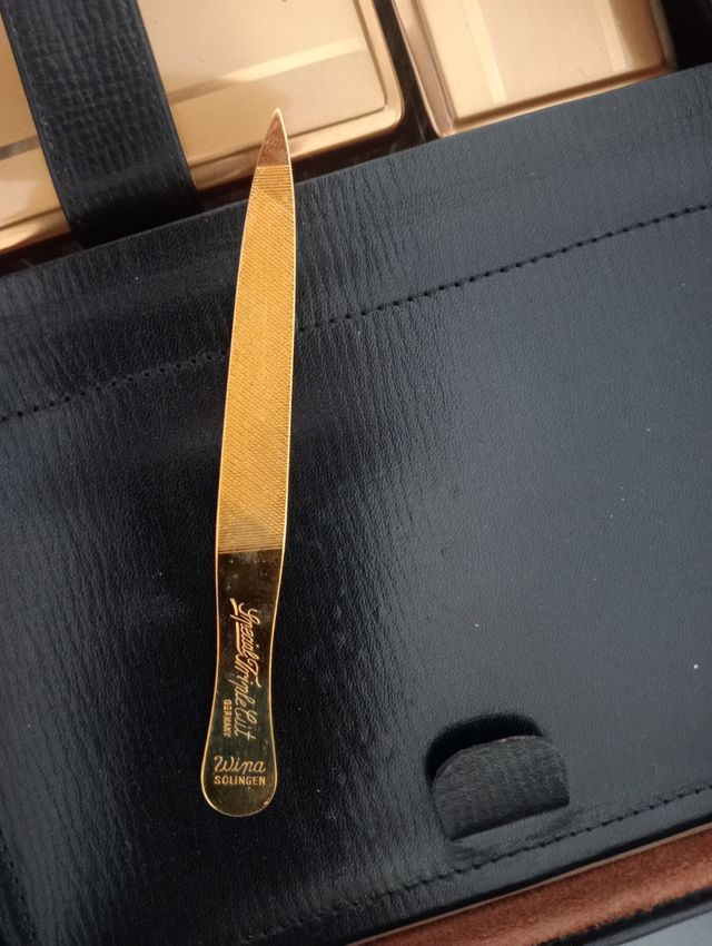 Set accessori persona pelle marrone oro