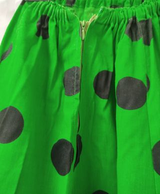 Falda flamenca verde con lunares y volantes