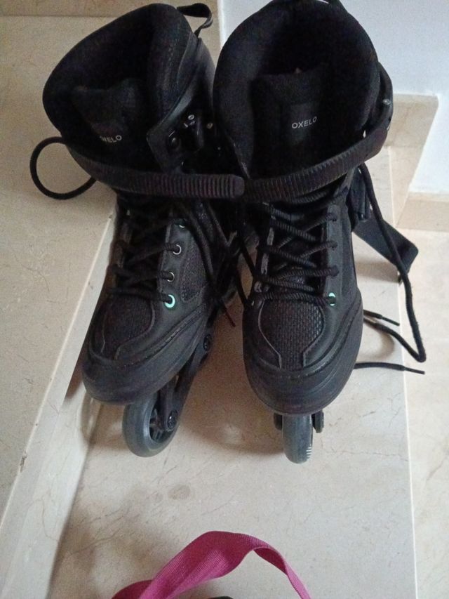 Patines en línea negros con bolsa