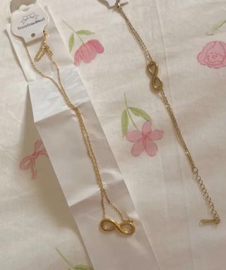 Conjunto collar y pulsera infinito