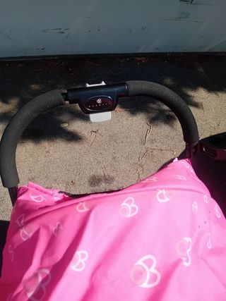 Passeggino rosa e nero