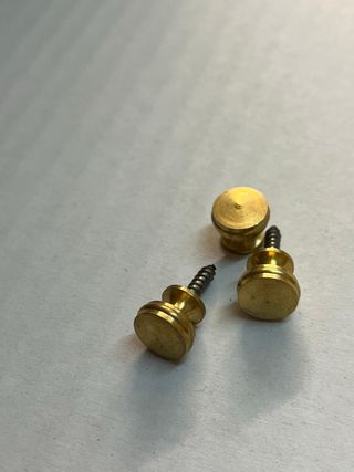 Tiradores dorados para muebles