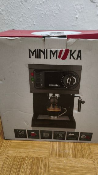 Cafetera cápsulas y porta