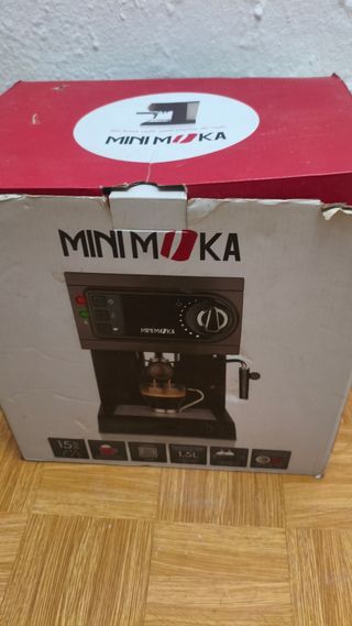 Cafetera cápsulas y porta