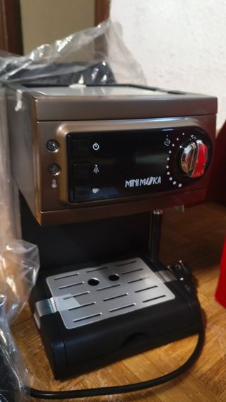 Cafetera cápsulas y porta