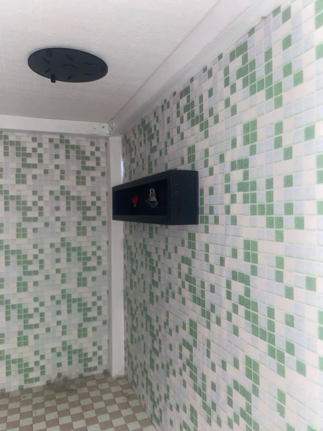 Casita de muñecas de madera hecha a mano