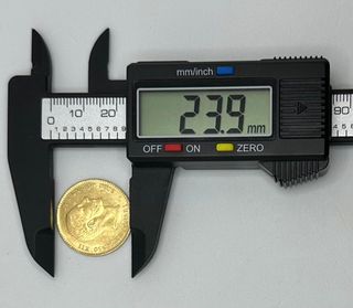 Moneda de oro de 21,6k, 8.09 g.