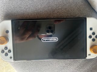 Controlli OLED per Nintendo Switch neri, bianchi