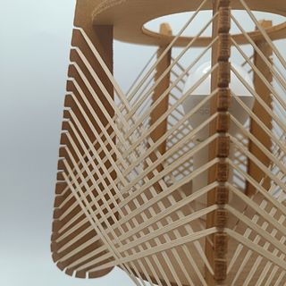 Lámpara de hilos y madera