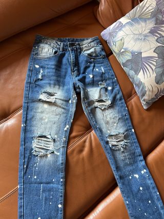 Pantalones DSquared2 rotos con pintura