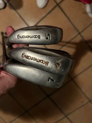 Palos de golf y pelotas