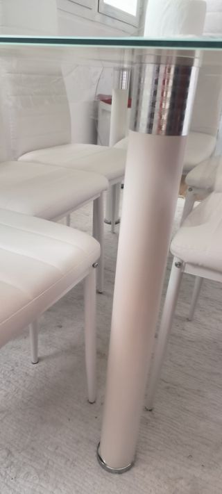 Mesa cristal y 6 sillas nuevas