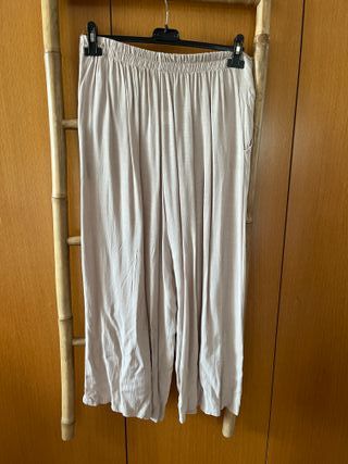 Pantalón beige Hua Qiang Fashion