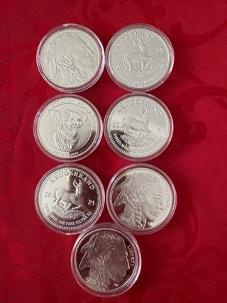 Lote 7 monedas chapadas en plata 
REPLICAS !