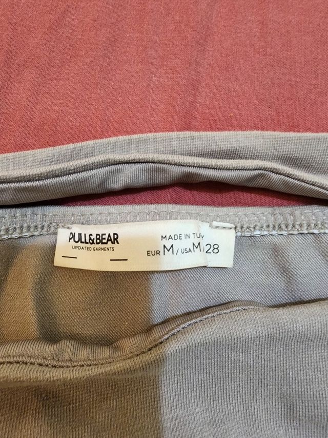 Top corto gris sin hombros