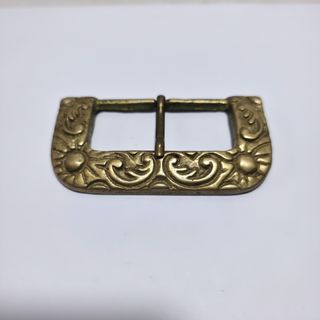 Antica fibbia in bronzo dorato lavorata