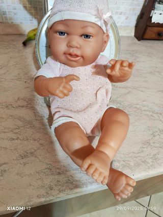 Bambolotto neonato rosa con cappellino