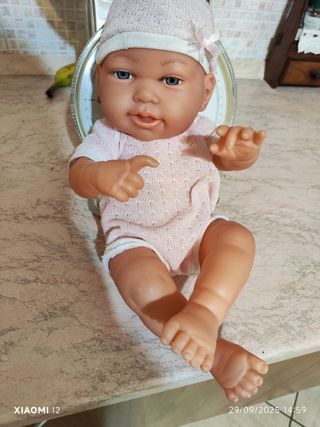 Bambolotto neonato rosa con cappellino