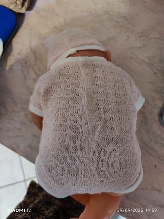 Bambolotto neonato rosa con cappellino