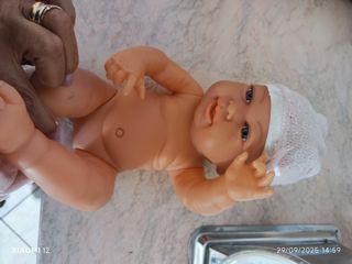 Bambolotto neonato rosa con cappellino