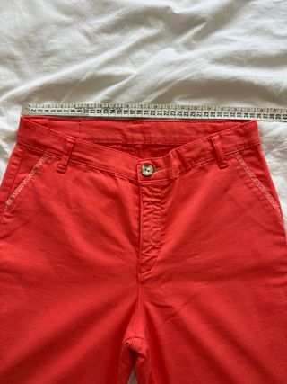 Pantalones de pinzas color coral