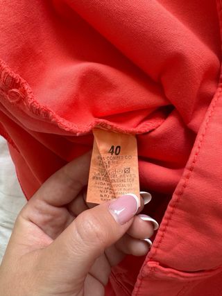 Pantalones de pinzas color coral
