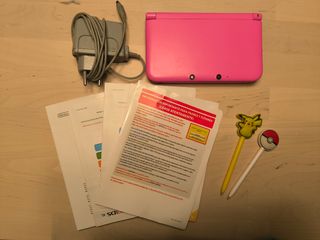Gioco, manuale e caricabatterie per Nintendo 3DS XL Pink +