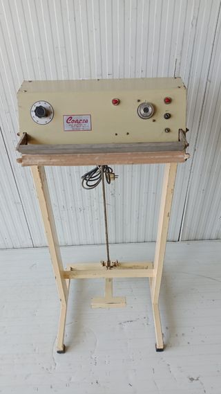 Envasadora y cerradora para grano