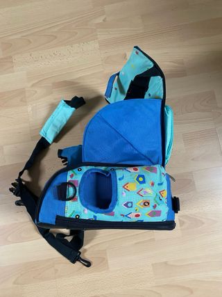 Trona de viaje infantil bbest con pájaros. 