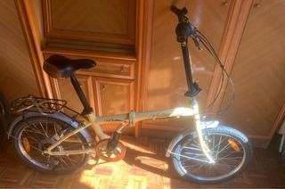 Bicicleta plegable color crema