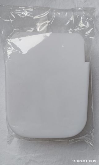 Supporto da parete bianco per telecomando/cellular