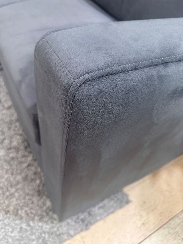 Sofá cama gris con arcón